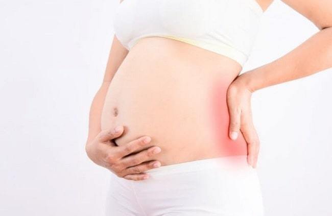 Đau lưng nhiều khi mang thai 4 tháng