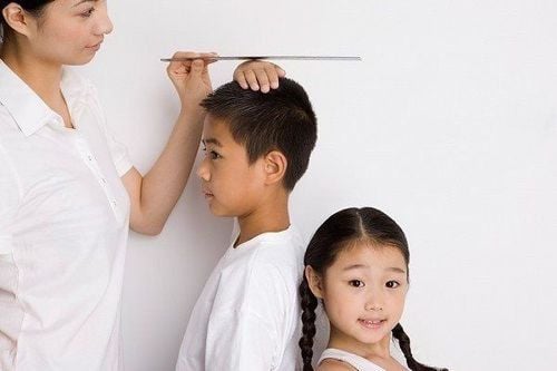How much has the height of Vietnamese people improved in the past 10 years?