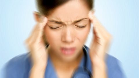 What is a vasomotor headache and how is it treated?
