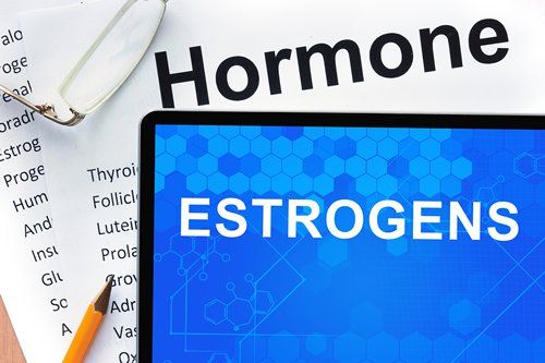 What symptoms does a lack of estrogen cause?