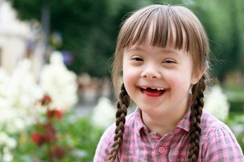 What is the cause of Down syndrome in the fetus?