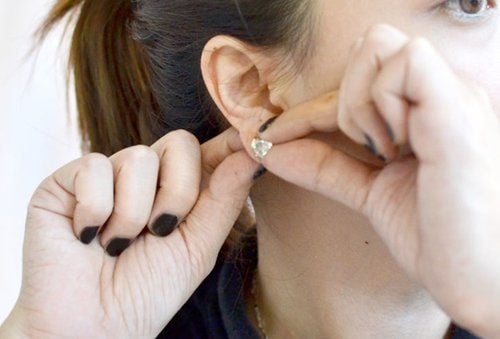 Is it safe to wear earrings while sleeping?