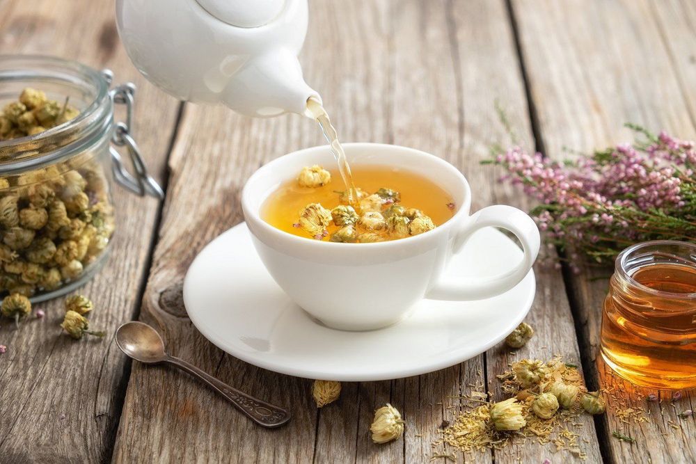 Drinking herbal tea is one way to treat cough and sore throat