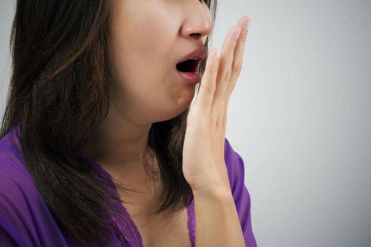 What is a white tongue with bad breath?