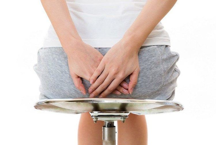 How are women treated for hemorrhoids?