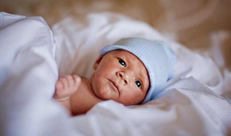 Uneven skin color in newborns is very normal.