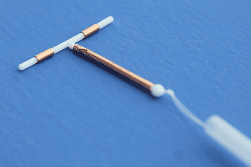 On what day of the menstrual cycle should the IUD be inserted?