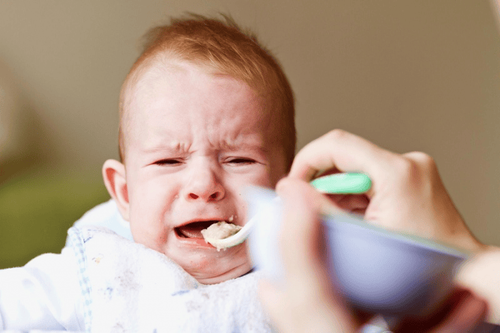 What to do when a 9-month-old baby vomits, slows down in weight gain?