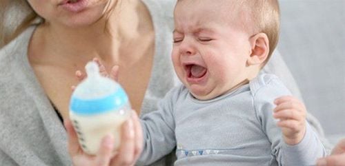 Forcing the baby to drink too much can lead to spitting up milk.