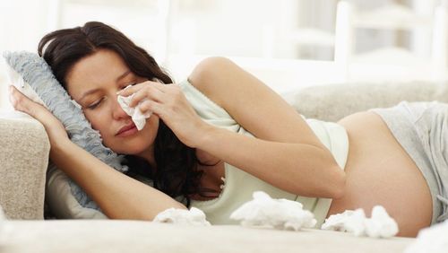 How does a cold or flu during pregnancy affect the baby?