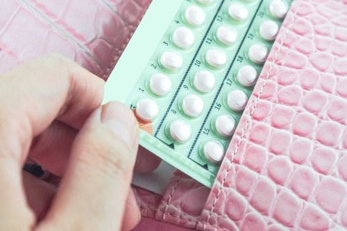 Does taking oral contraceptives combined with an IUD have any effect?