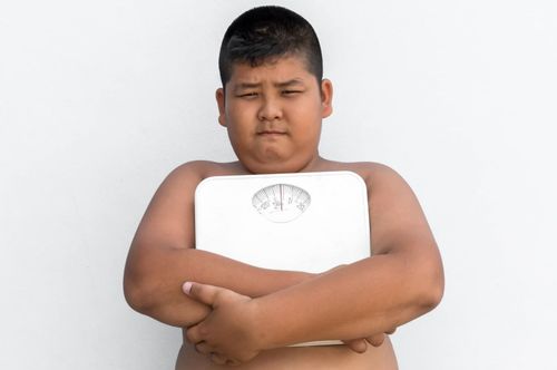 Why are children prone to obesity during puberty?