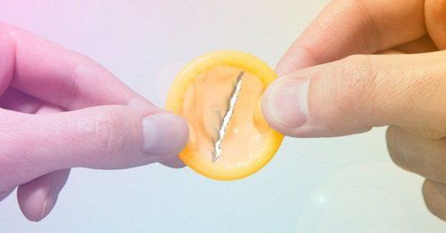 Is it okay to tear the middle of the condom during sex?