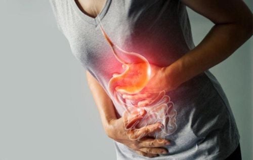 Stomach pain accompanied by blood in the stool is a sign of what disease?