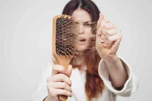 Do low levels of ferritin (iron storage protein) cause hair loss?