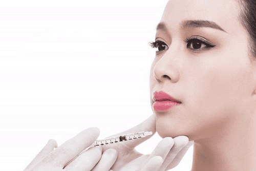 How long does chin filler injection take to stabilize?