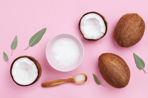 What are the benefits of using coconut oil on the face?