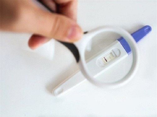 Pregnancy test strip 1 bold line, 1 faint line, missed period, is it pregnant?