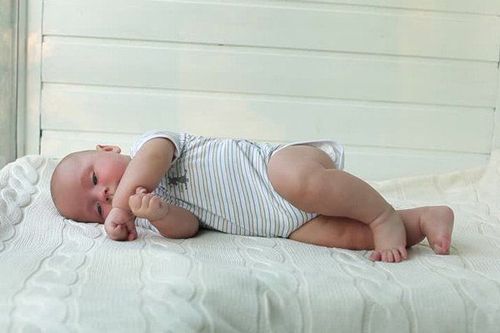 Why do babies roll over when they sleep?