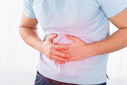 What causes abdominal pain around the navel with vomiting?