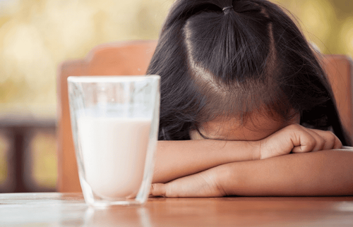 Why does drinking raw milk cause diarrhea?