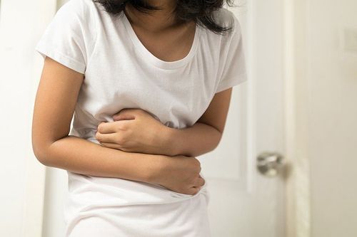 What are the signs of pain in the lower abdomen with frequent urination?